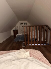 Attic bedroom in the casita. No window coverings