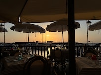 View from pool area during sunset.