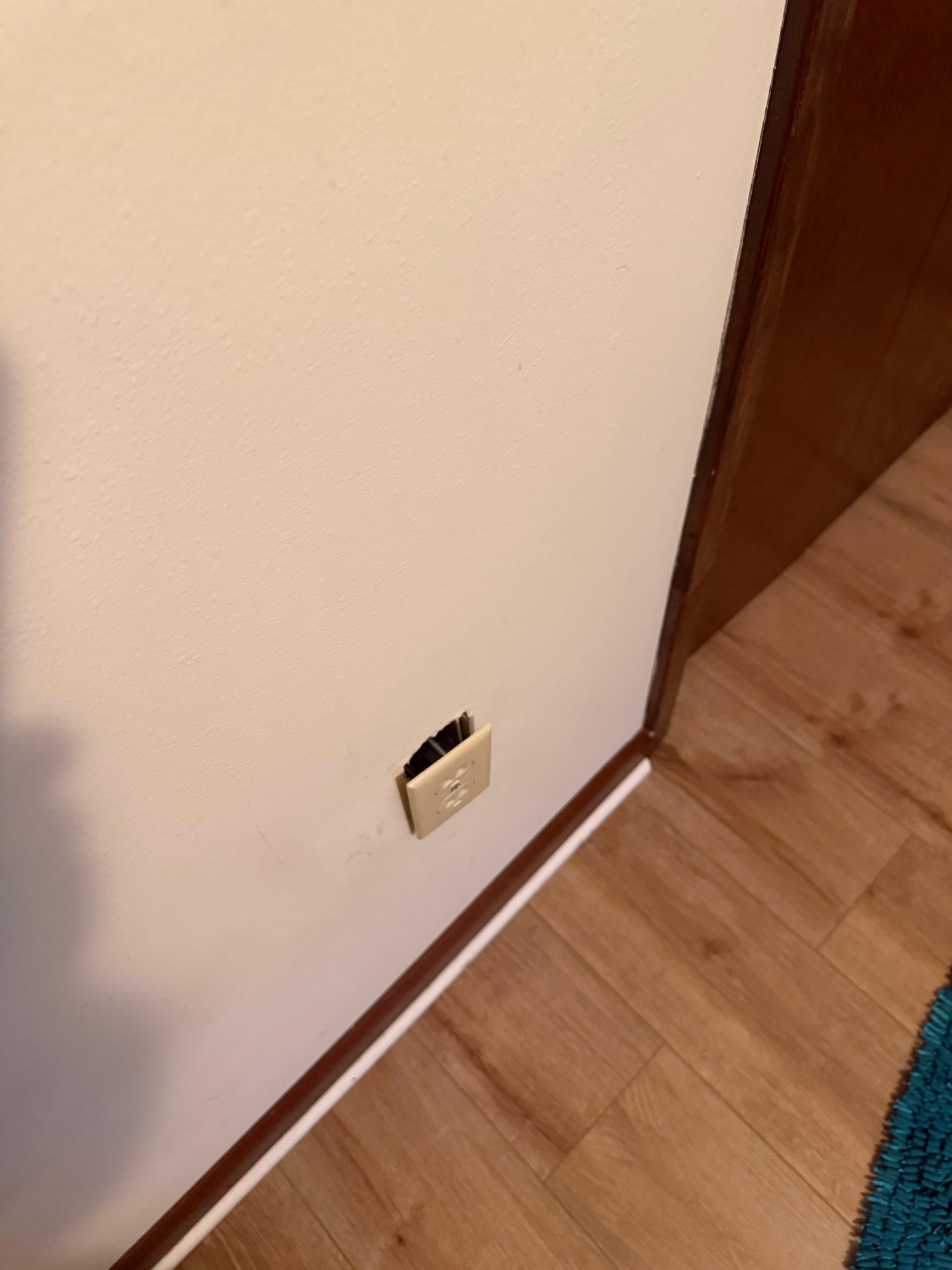 Receptacle hanging off the wall. (Danger for small children.)