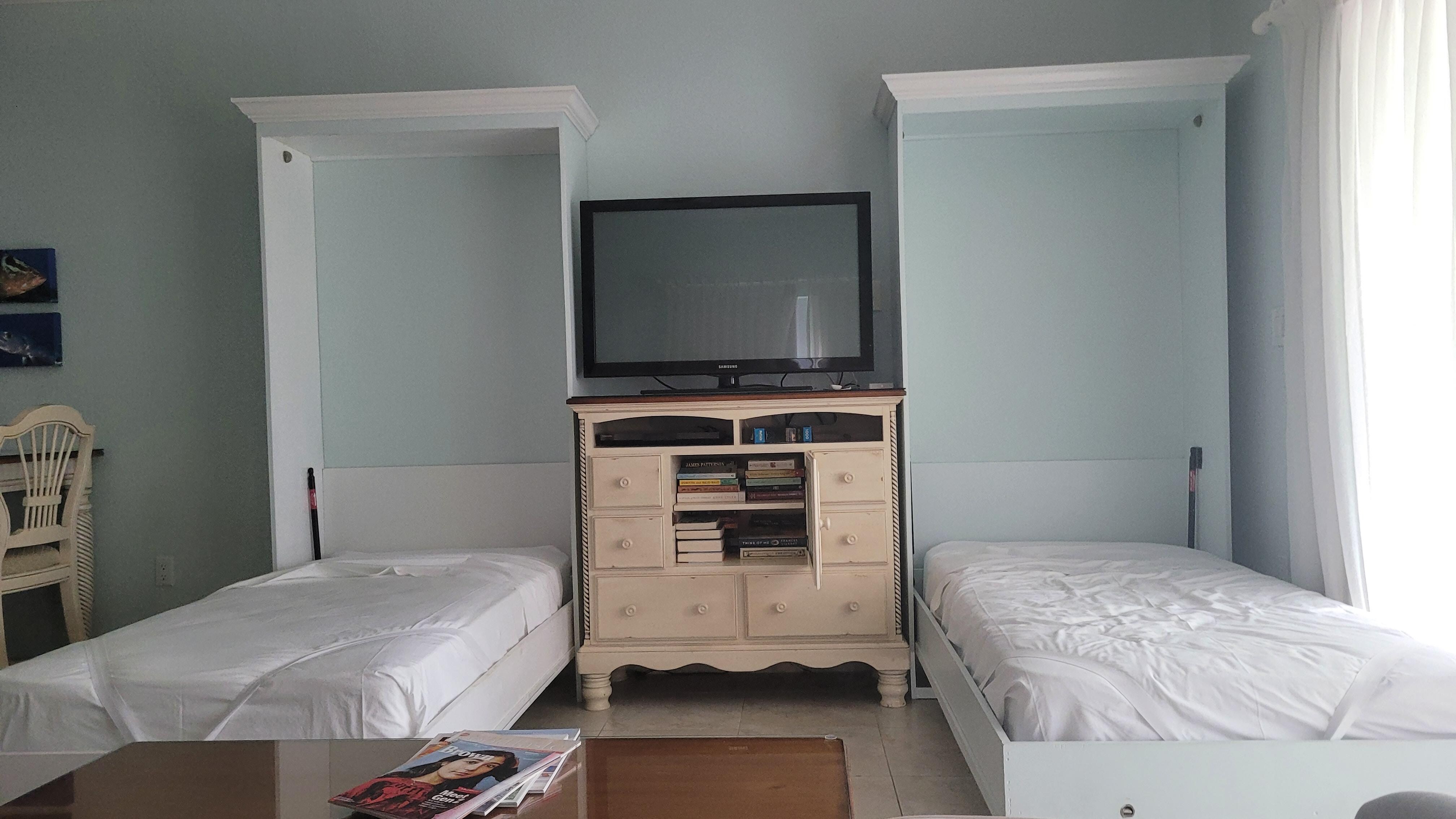 Kids twin bed in the living area. Perfect for family of 4 like  us as it gives the kids their own space. 