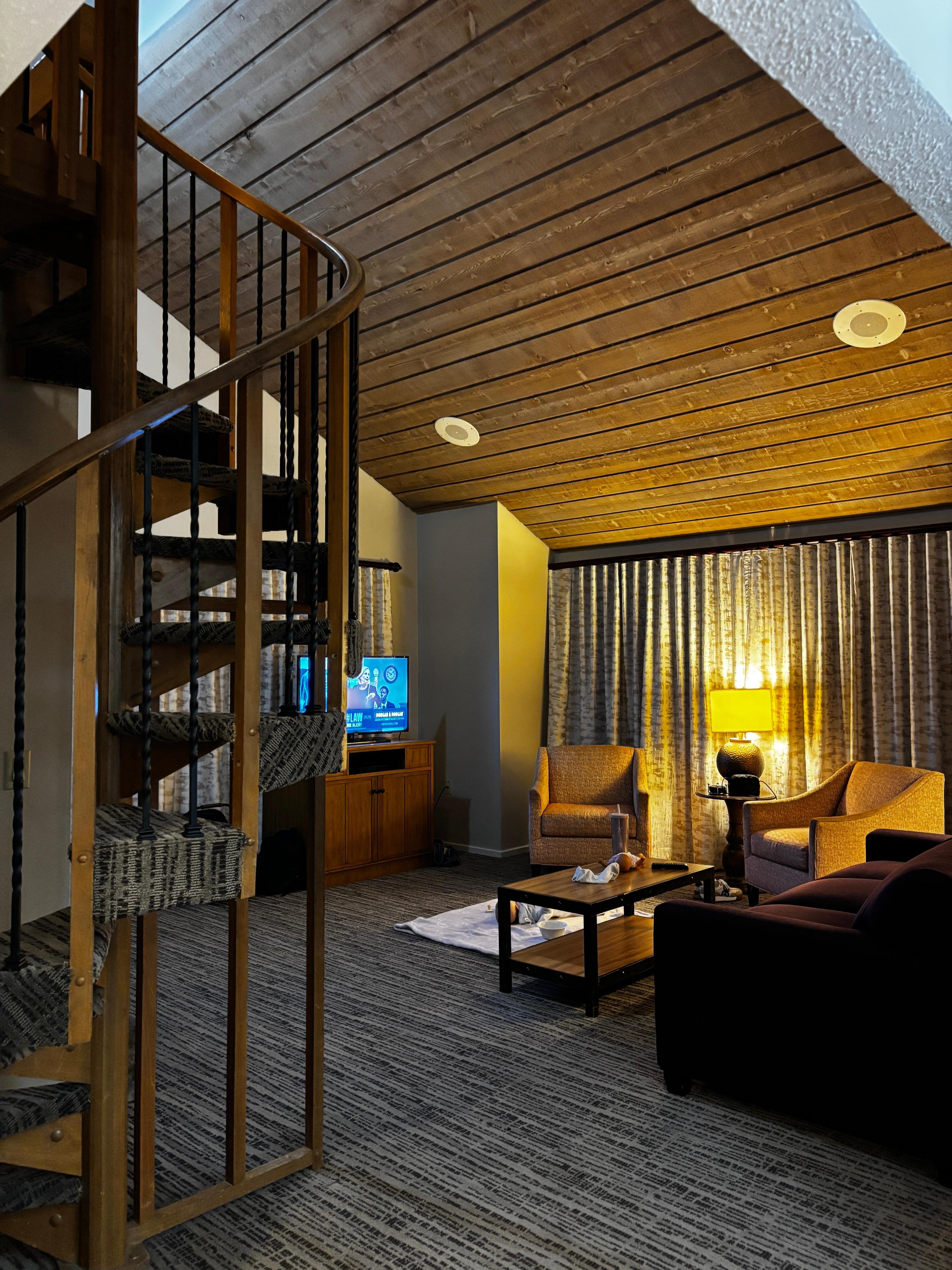 Very spacious living room with high ceilings and large windows with tons of light during the day.