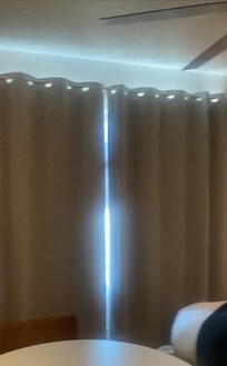 Wish they had a sheer curtain or privacy film on the street facing window.