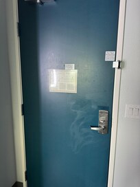 Splatter and filth on back of door.