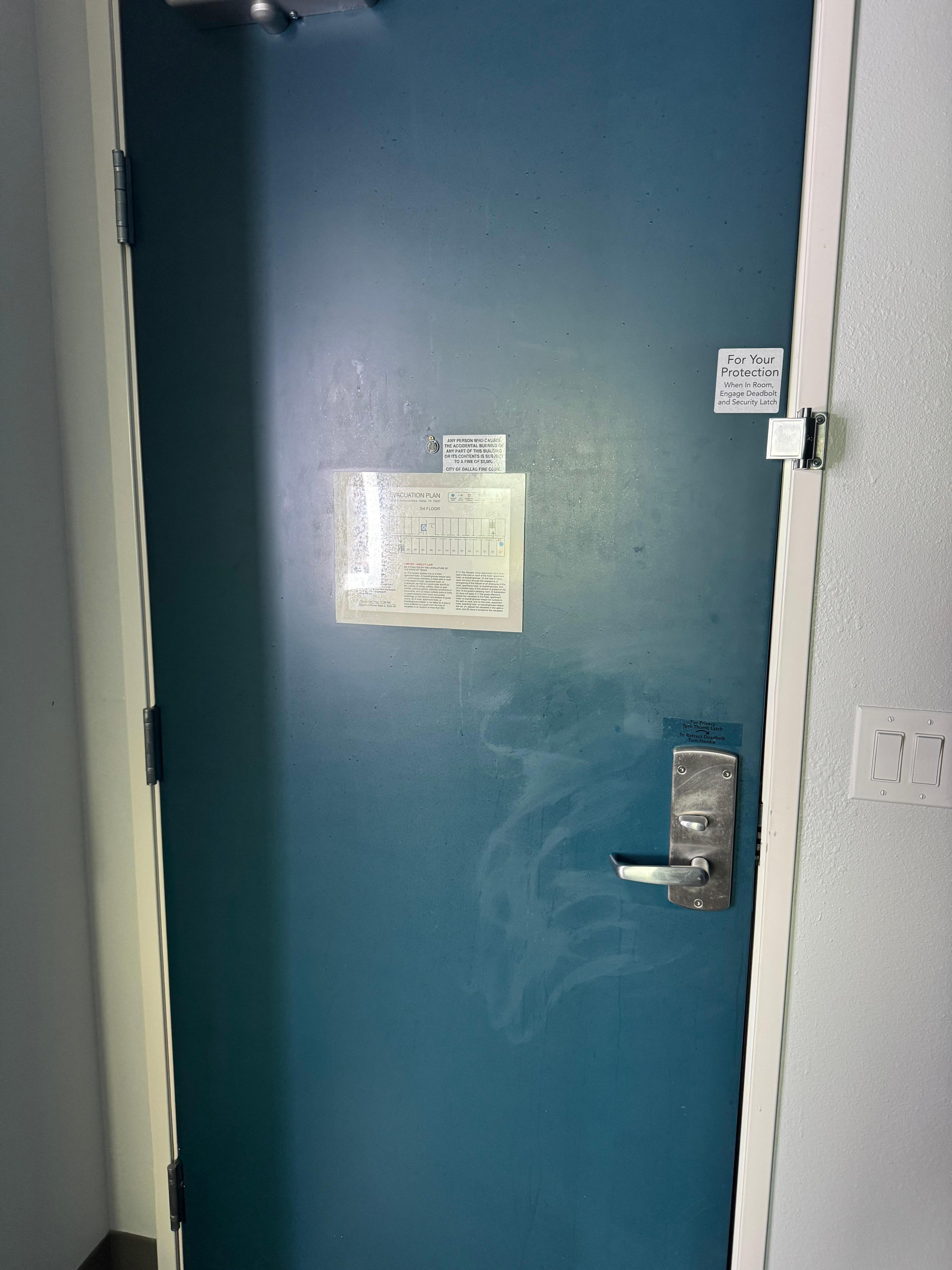 Splatter and filth on back of door.