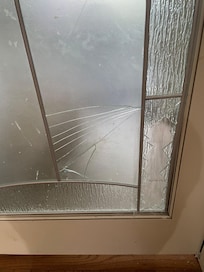 Broken window in door