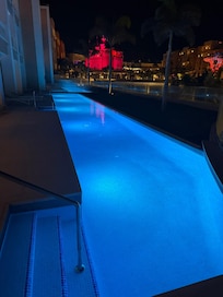 swim up pool by night
