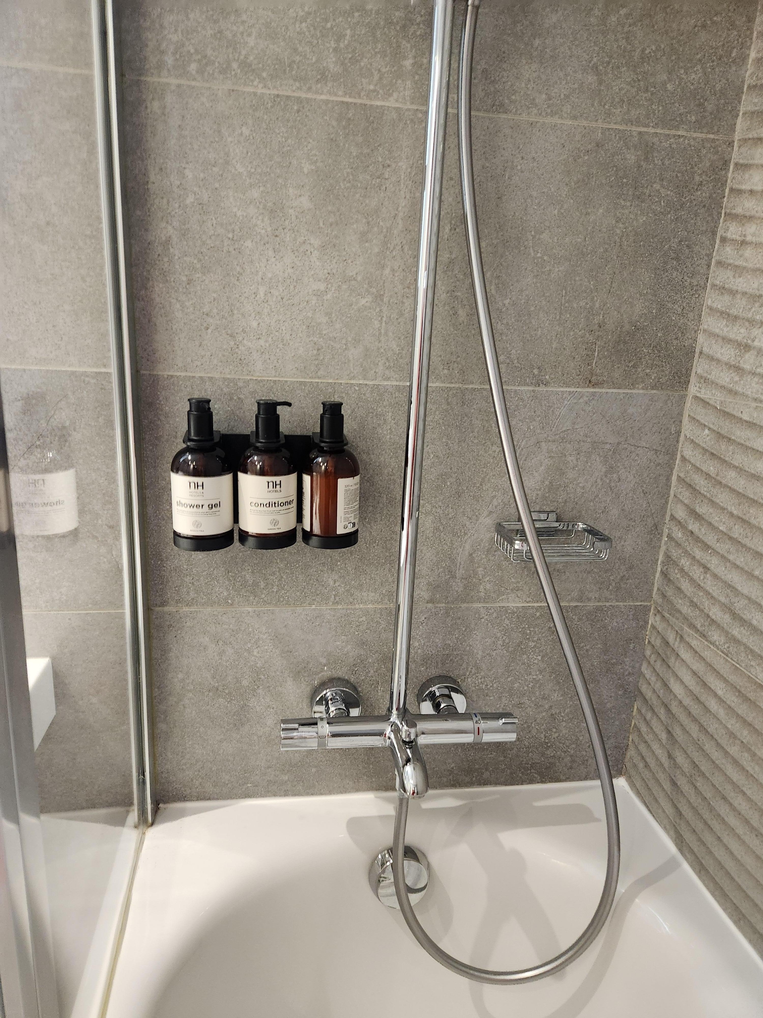 Bathroom hard to reach if tall using shower;if small as i am difficult also