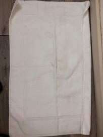 Dirty tub towel, shoe print and dirty