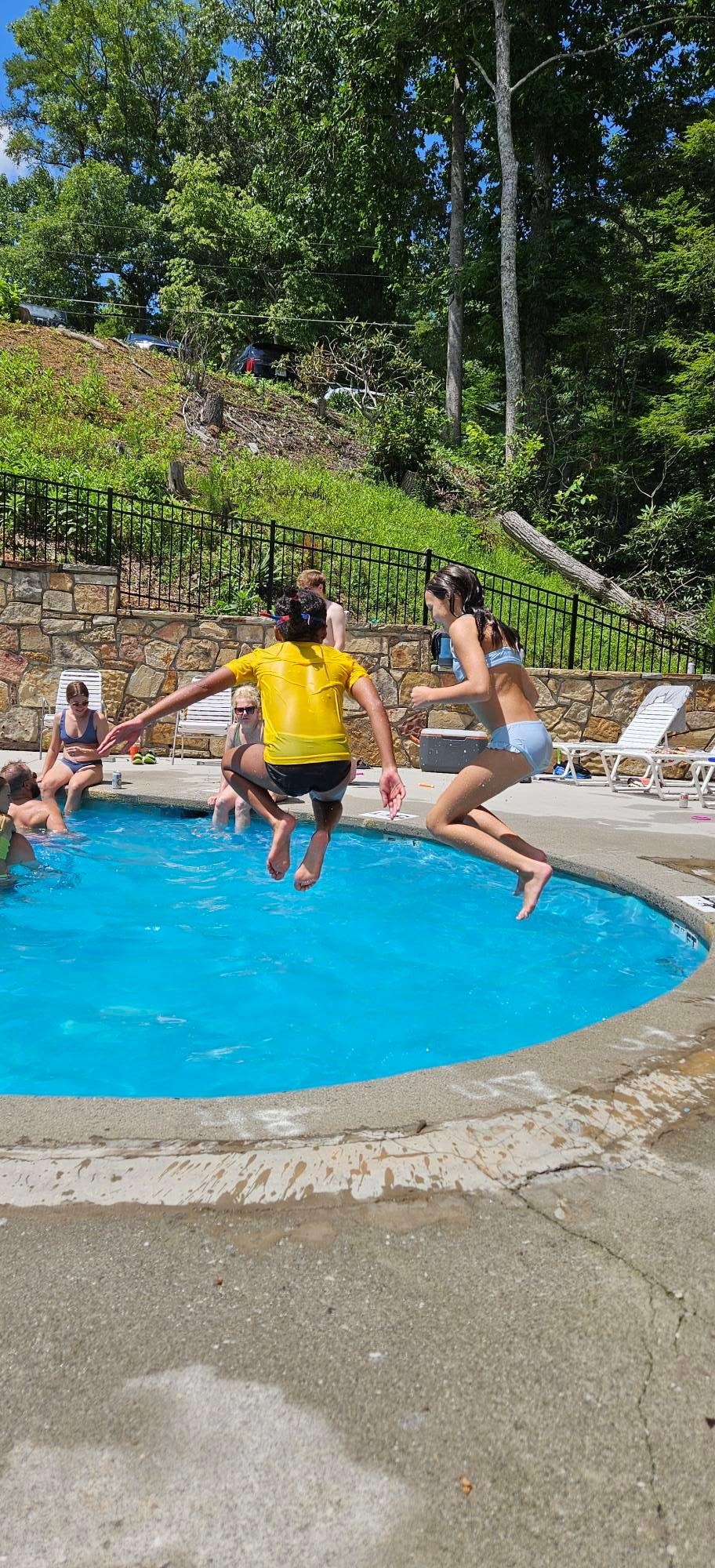 One of the pools in the neighborhood.  The girls had fun until the thunder began and we had to leave.  