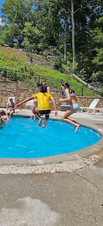 One of the pools in the neighborhood.  The girls had fun until the thunder began and we had to leave.