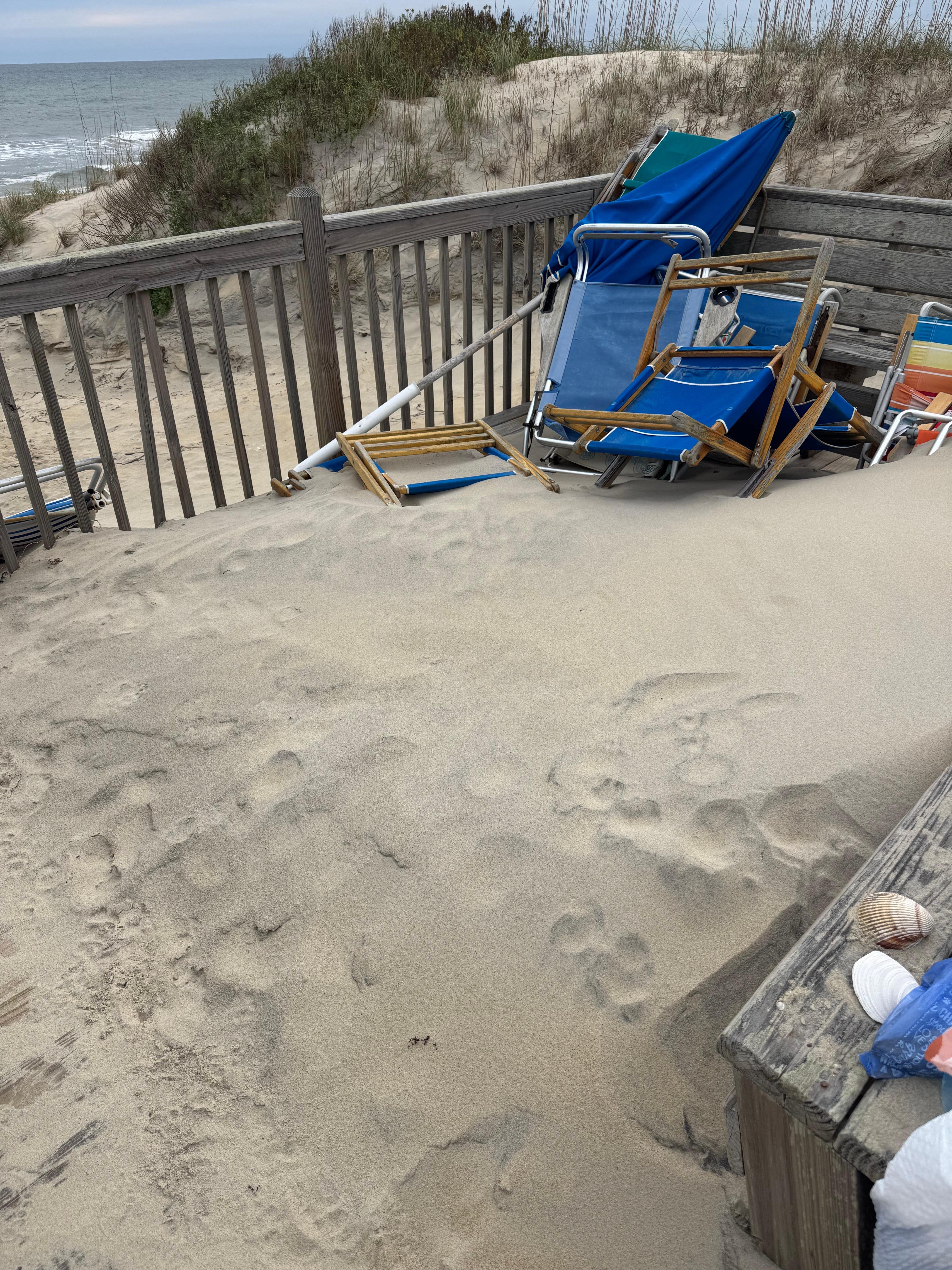 chairs under sand we dug these out