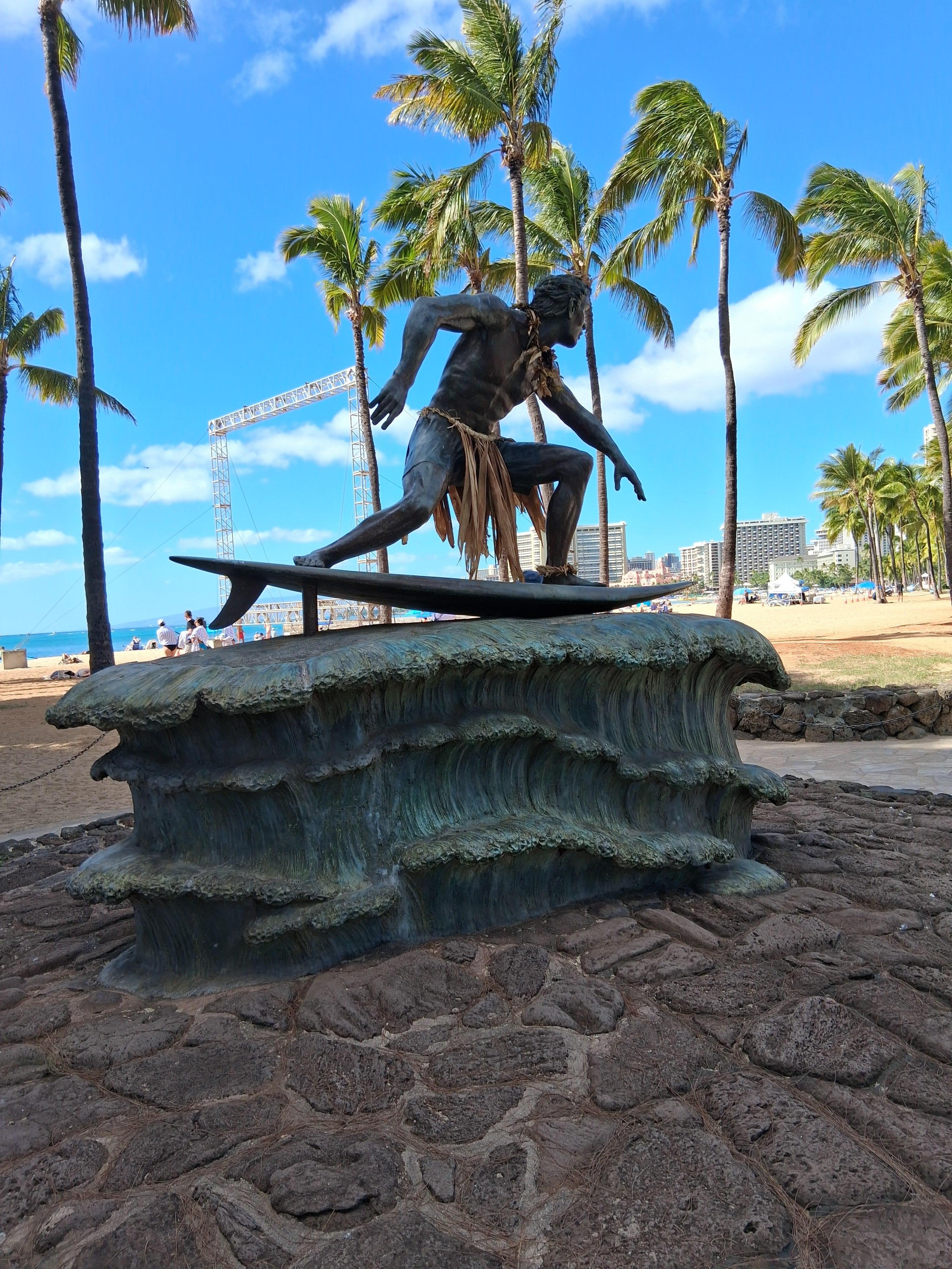 Popular statue of surfer . Same area beach near hotel.