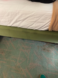 Stains on the bed.