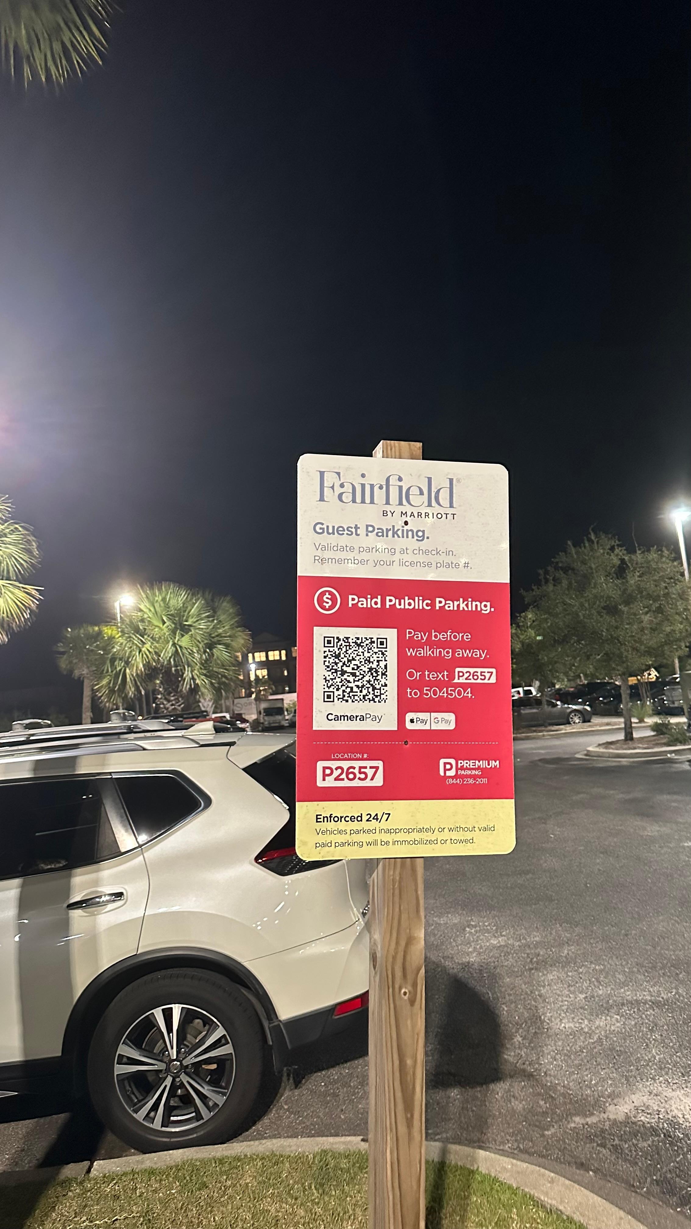 Guest lot is small but also used for paid public parking