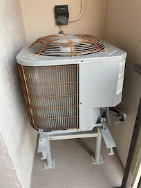 Rusted, old AC unit. Did not cool this small condo.