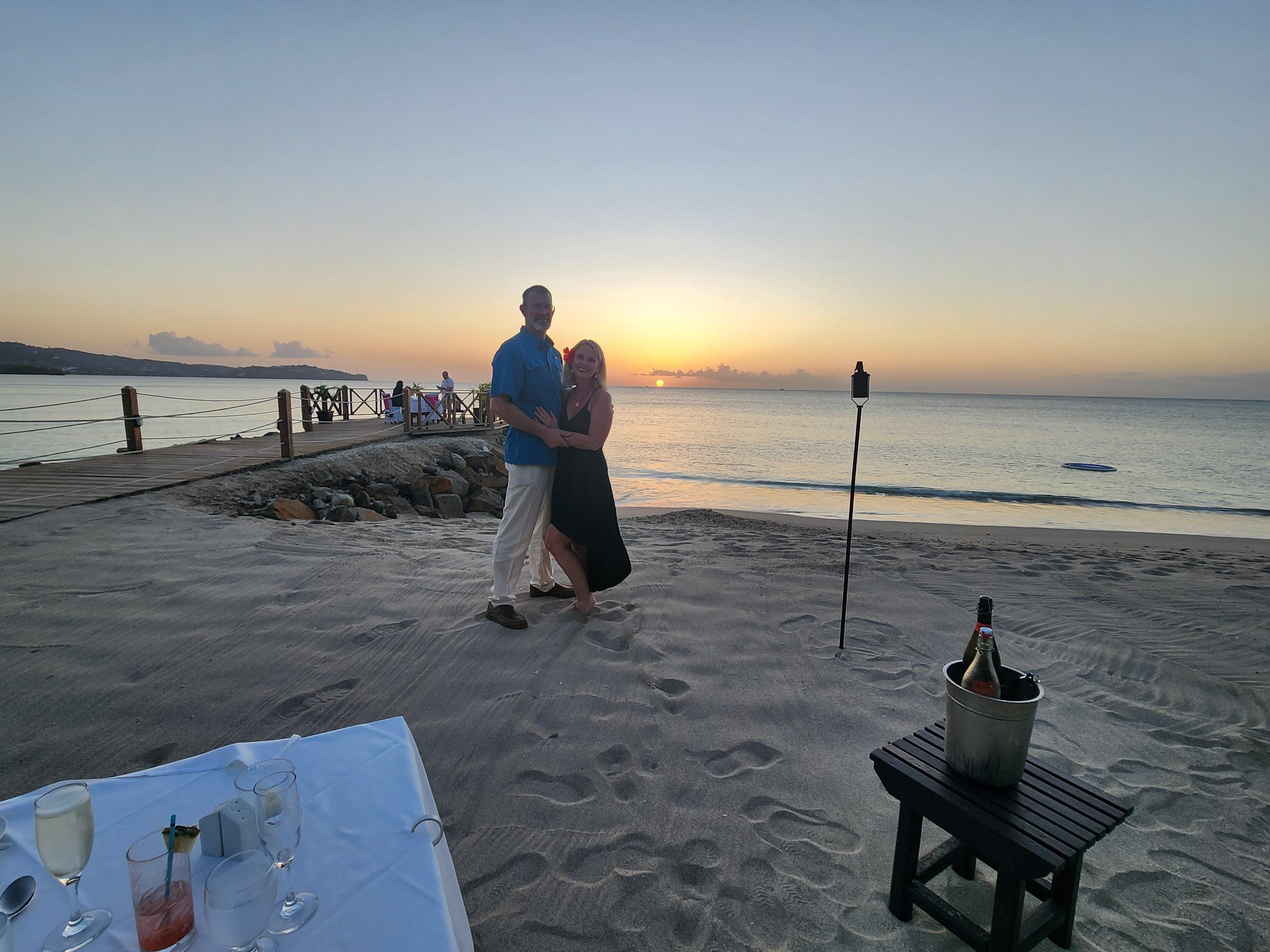 Our "private" dinner on beach with couple in gazebo behind us....not private!