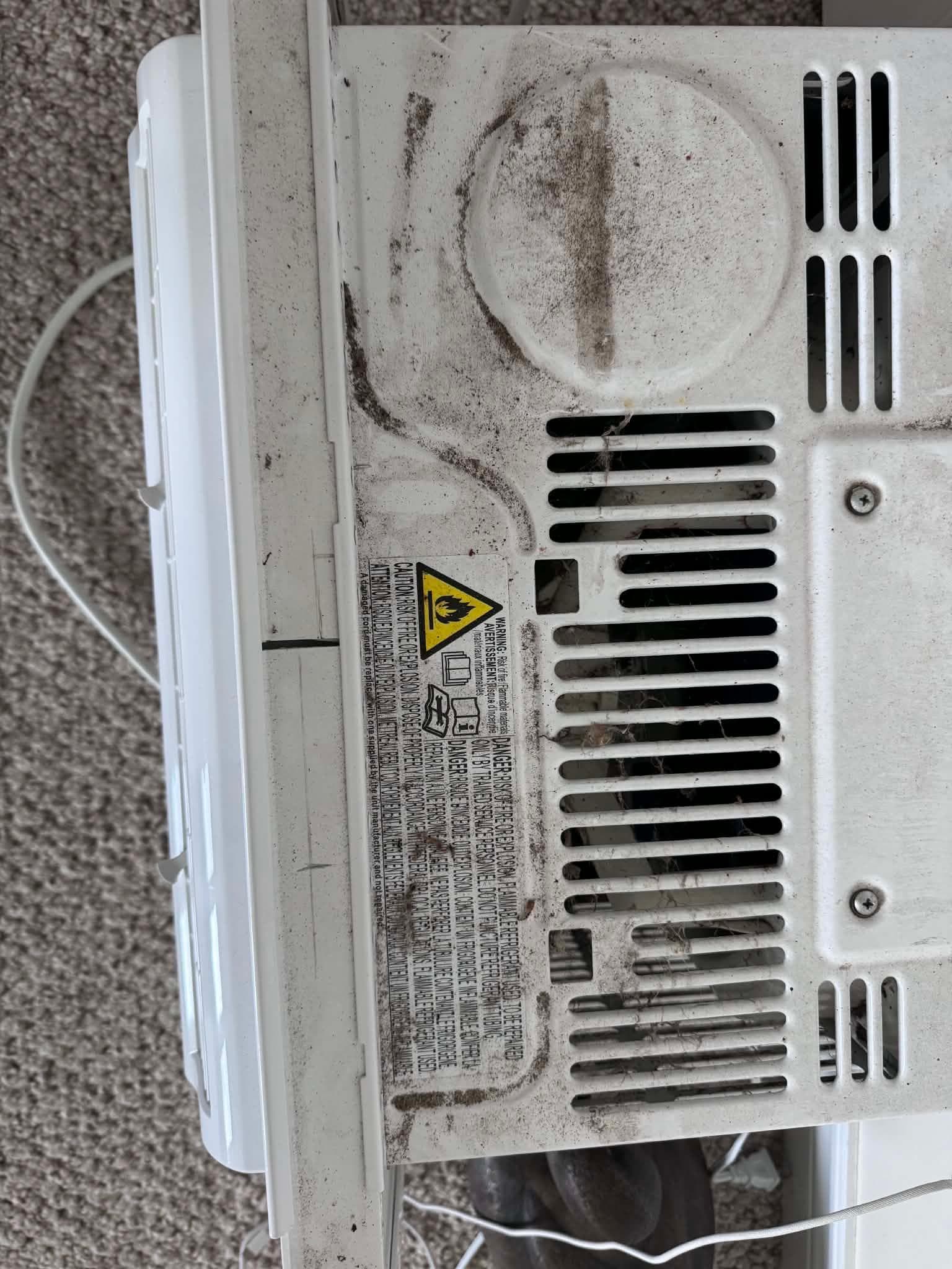 This was on the floor near a bed. All the units installed in the windows looked just as bad or worse.