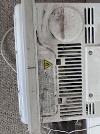 This was on the floor near a bed. All the units installed in the windows looked just as bad or worse.