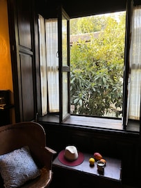 Room #6 with window facing courtyard