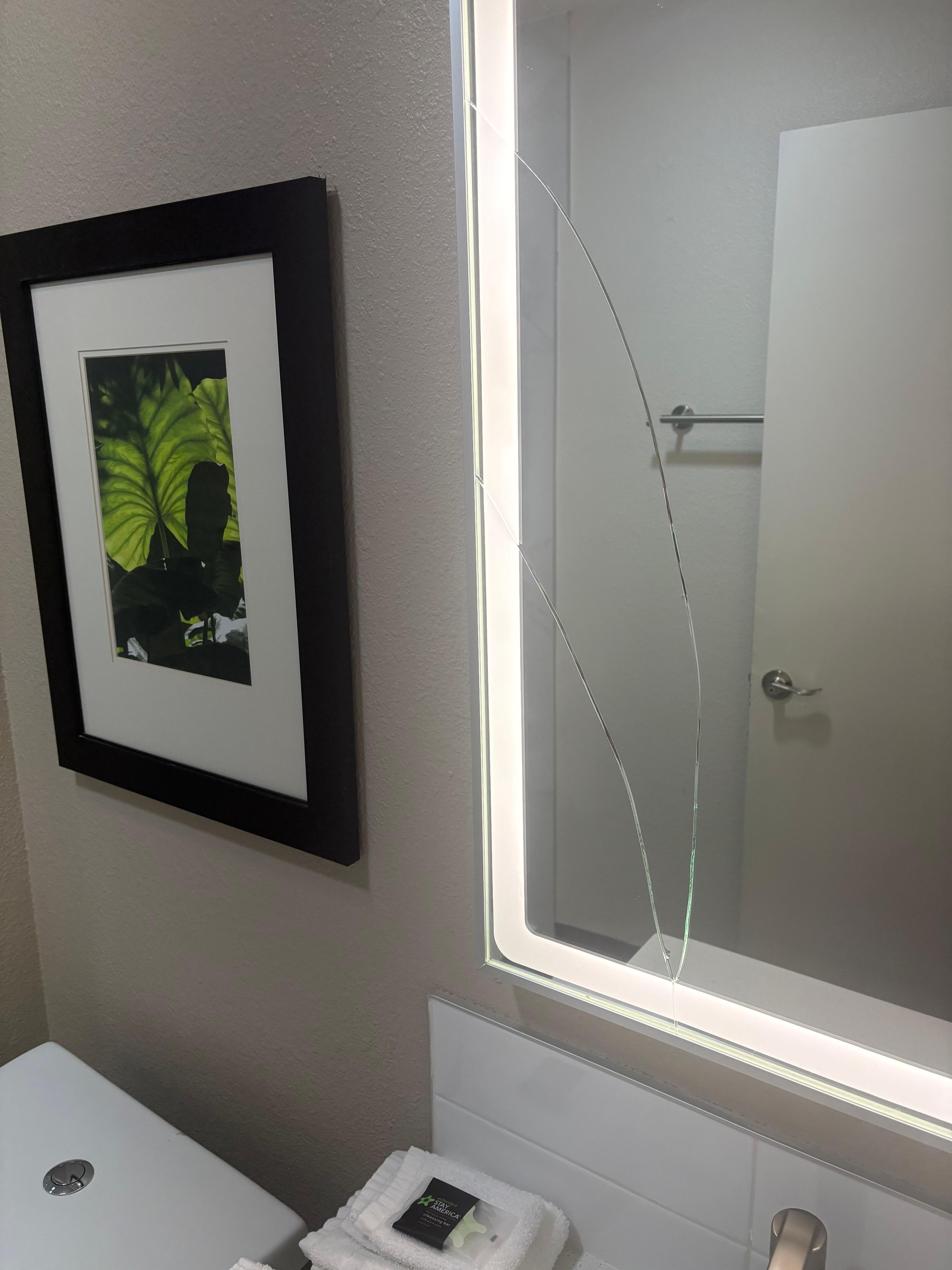 Broken bathroom mirror 