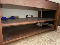 Bathroom shelves random things people left from not ever being cleaned.