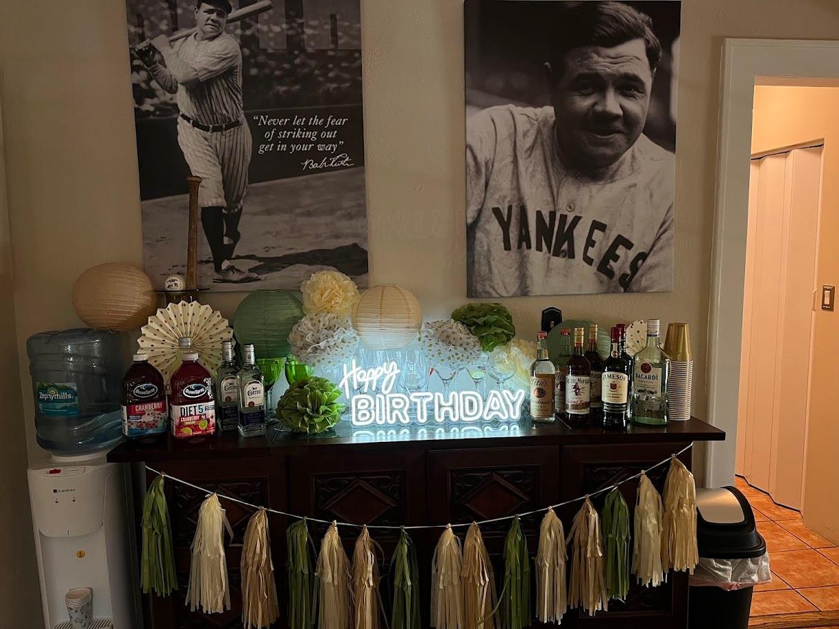 Bar area, complete with glasses, Babe Ruth memorabilia and history of the house (not pictured). 