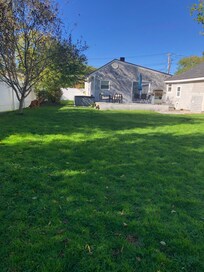 Large yard with nice deck for family and pups.