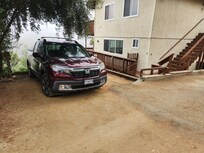 Parking space. Practical for only one vehicle.