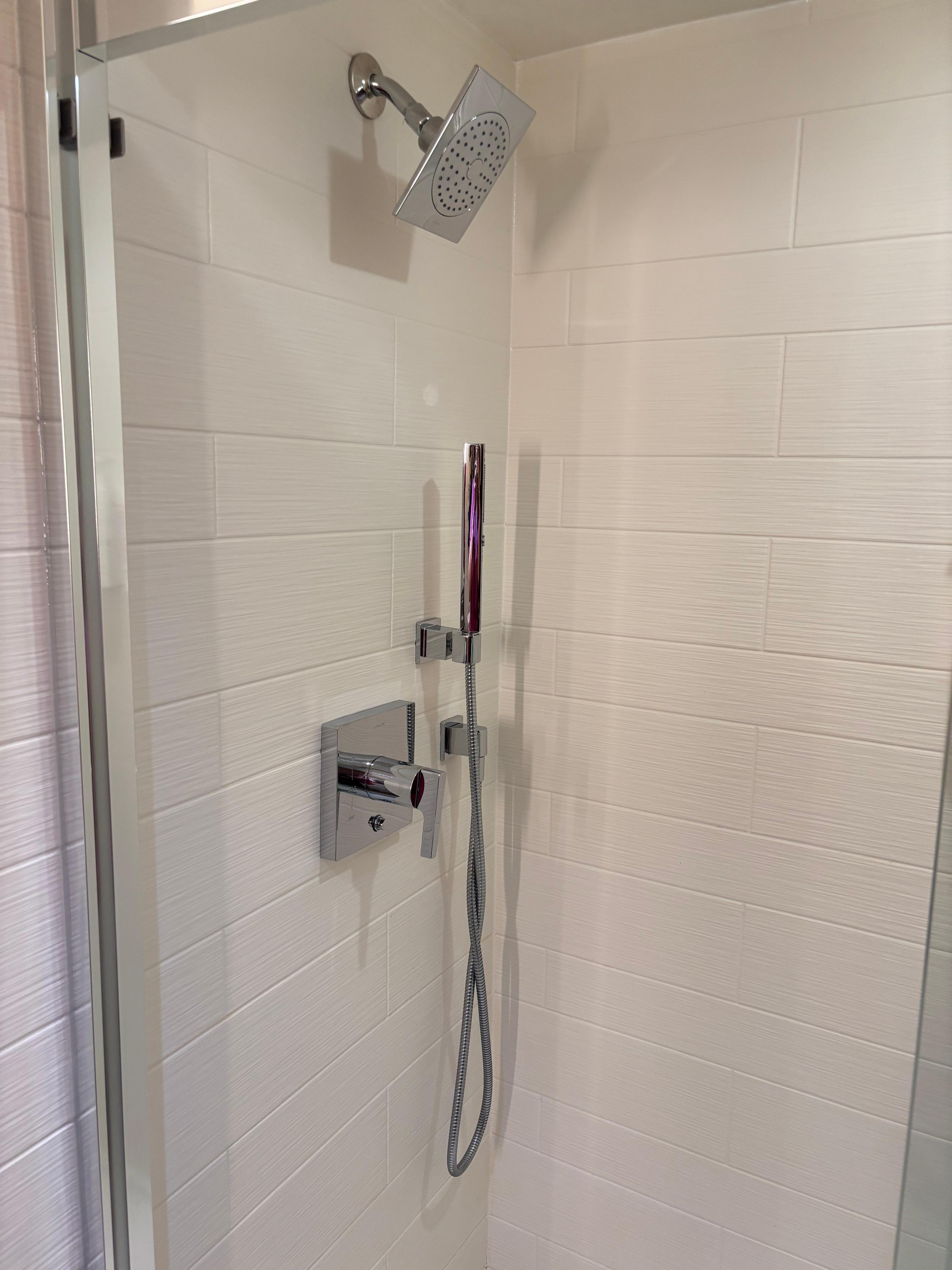 Love the addition of a handheld shower spray to completely rinse. 