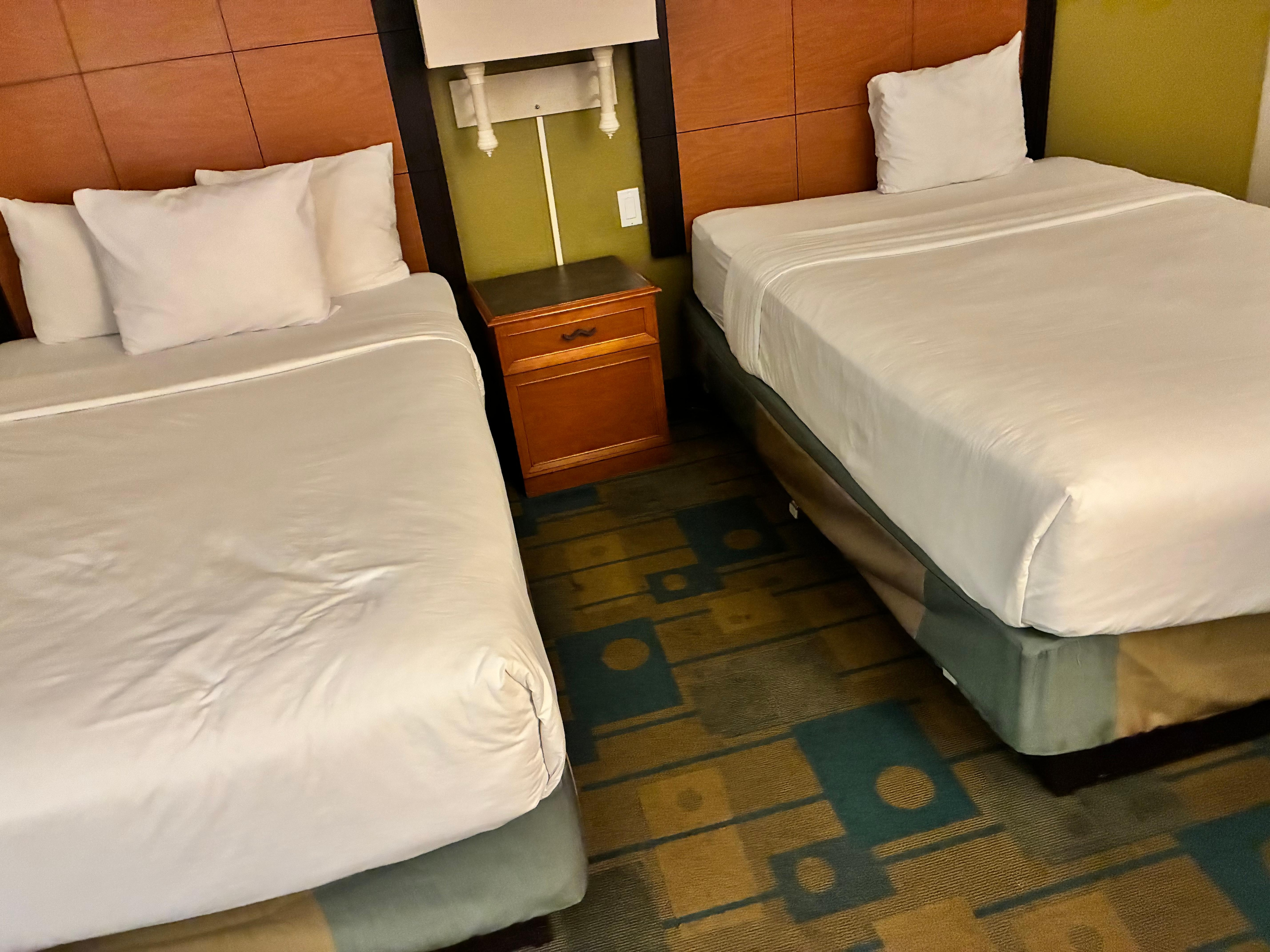 Bed missing blankets and all the pillows 