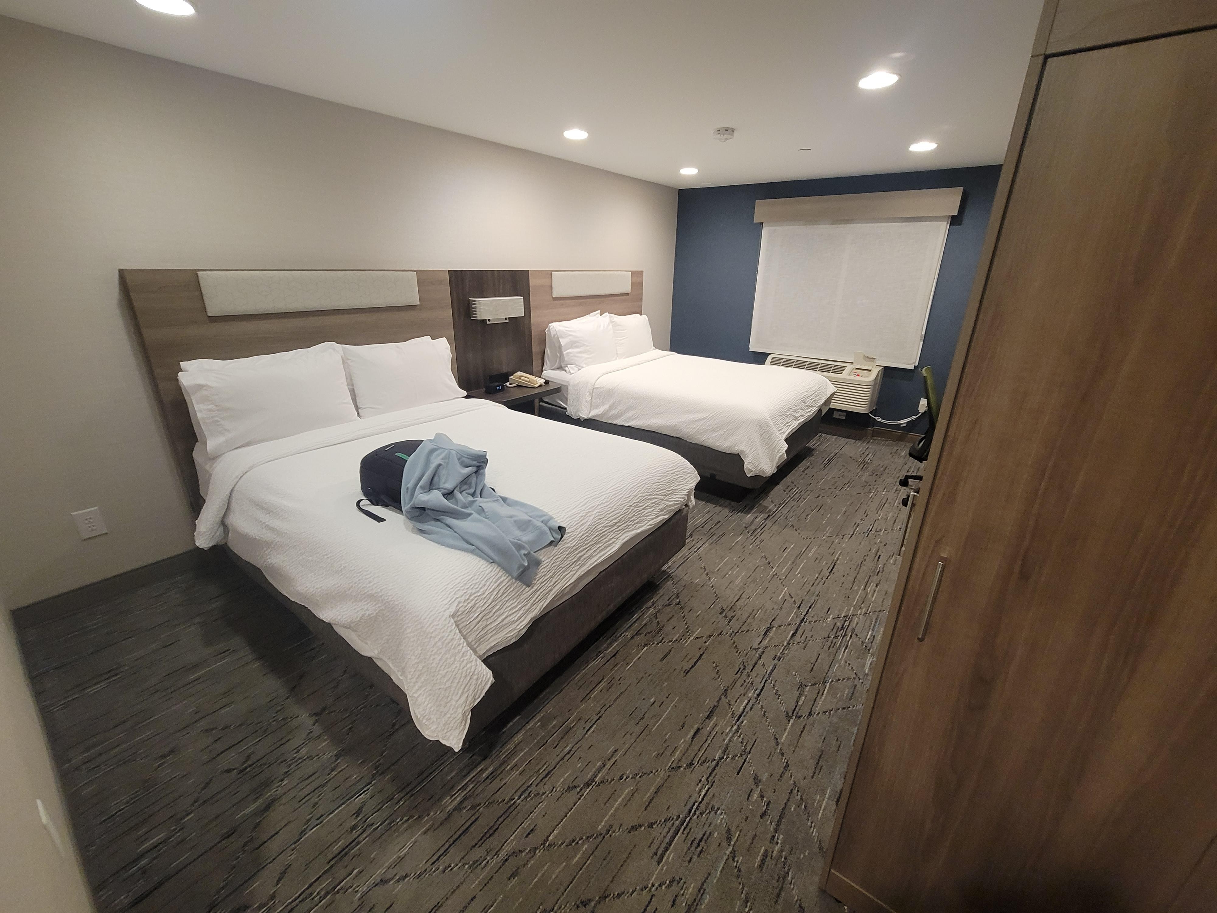 Room phone uses 2 lines so you may need to refer to the front desk for assistance. 