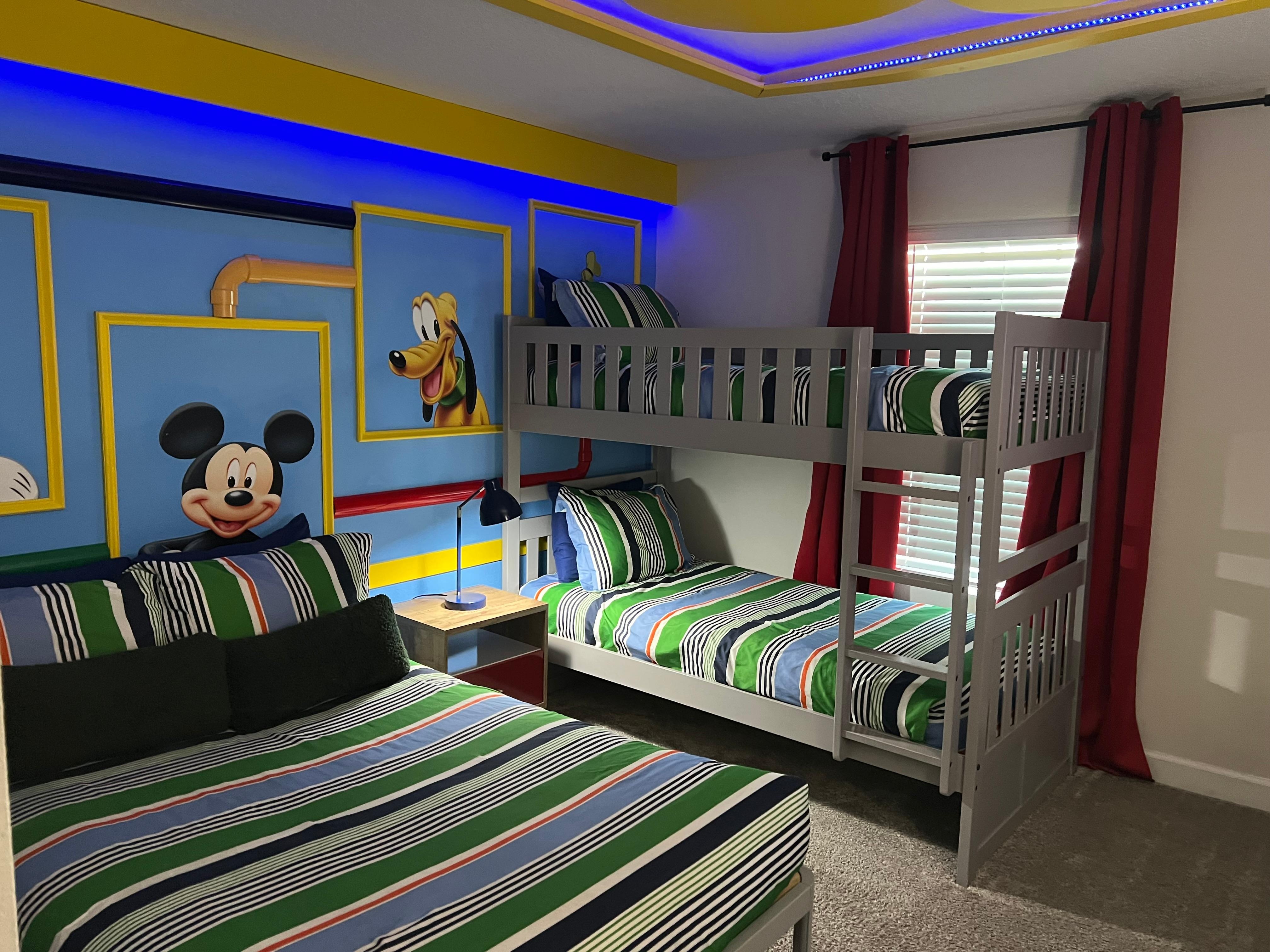 Two bedrooms have this bed set up, the other is Harry Potter, all have TVs