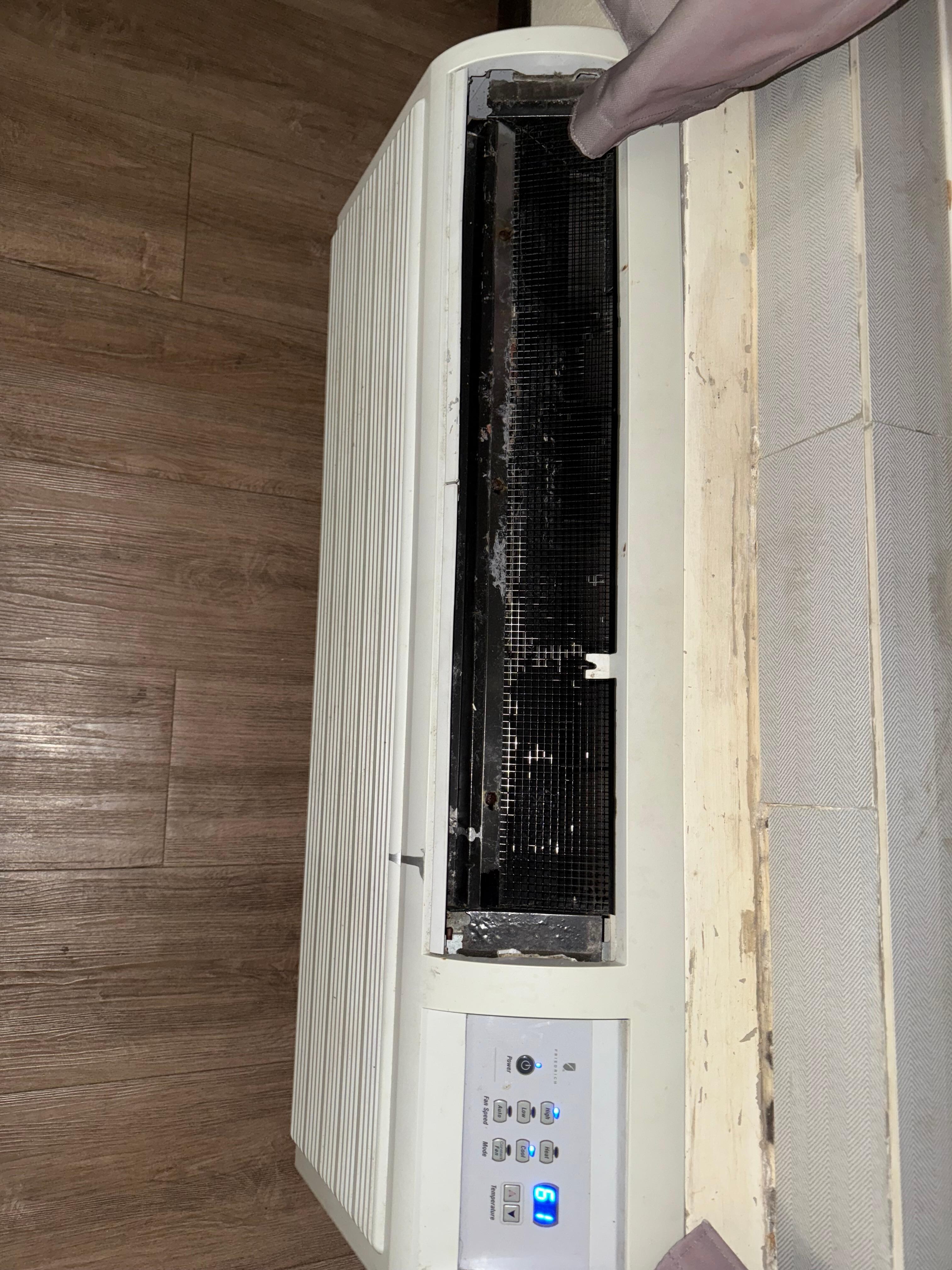 A/C is old and covered with mold