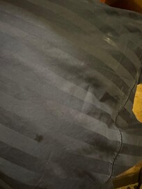 Toothpaste marks on pillow (as found on arrival)