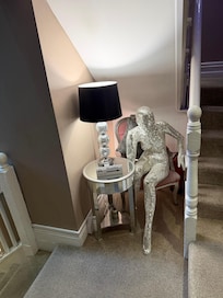 Landing between floor with our room and reception.