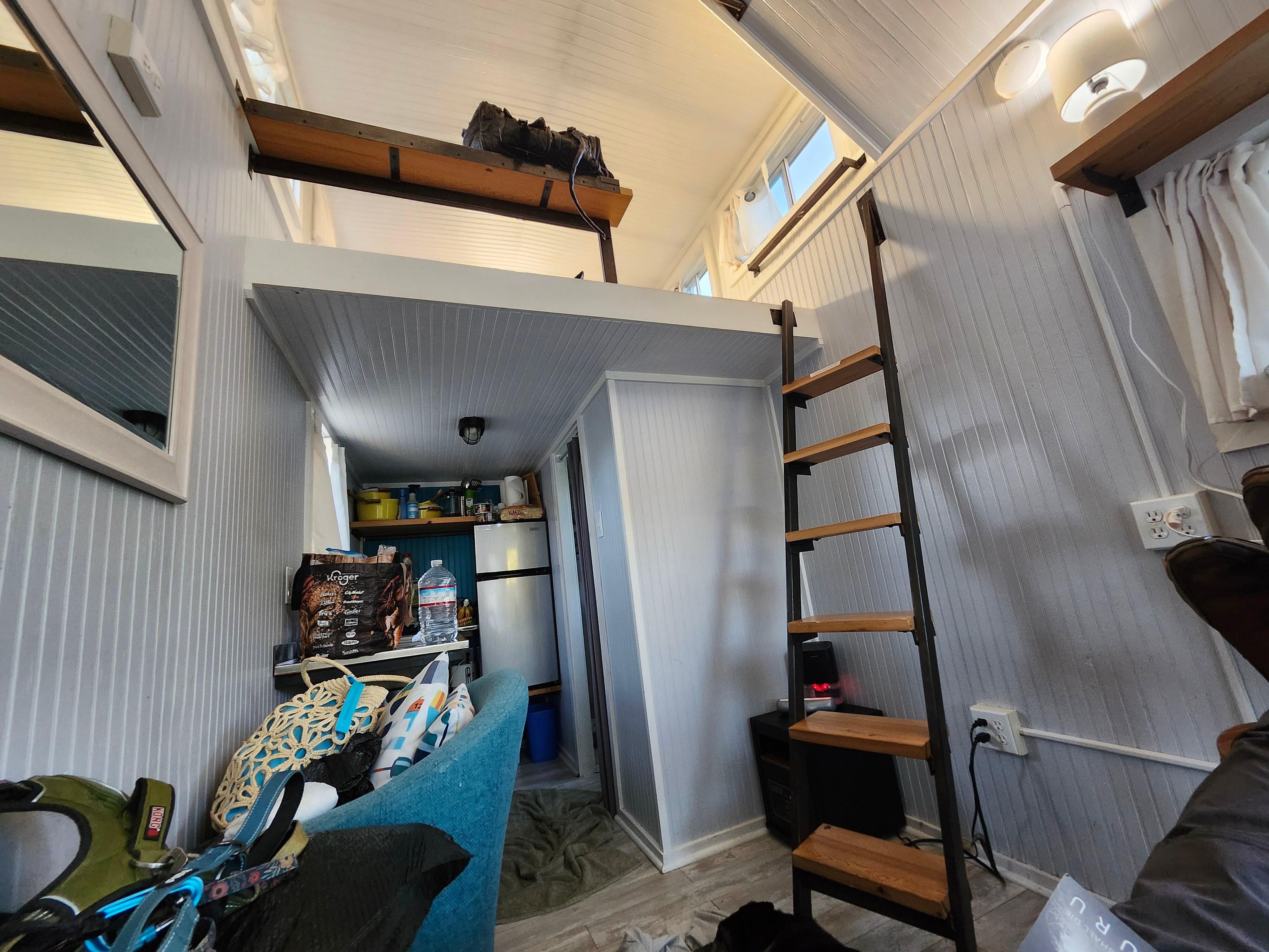 Driftwood view of Kitchen and loft where bed is