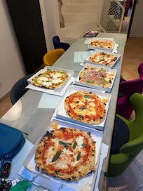Pizza from next door, plenty of room at dining room table for all 9 of us.