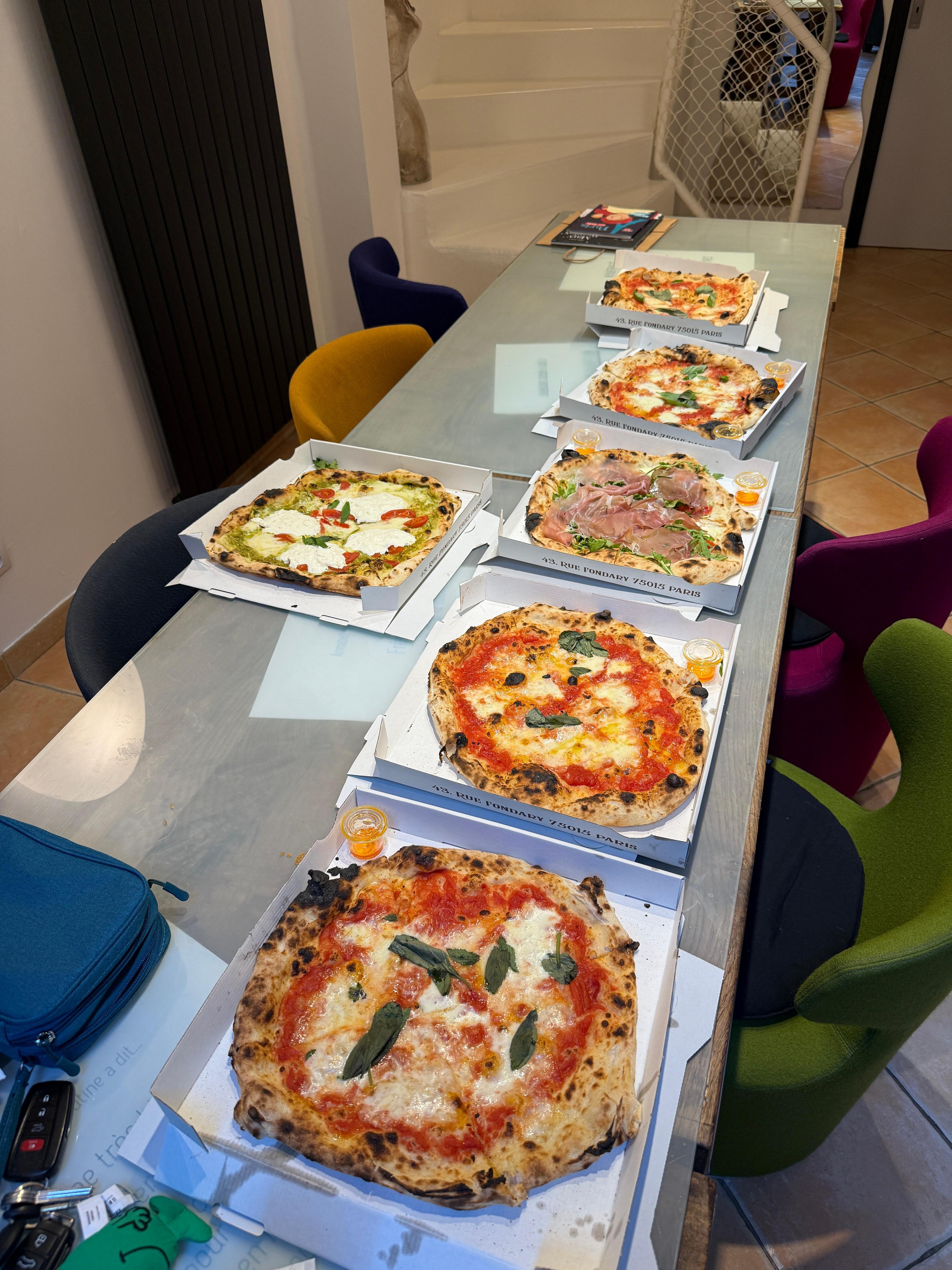 Pizza from next door, plenty of room at dining room table for all 9 of us.