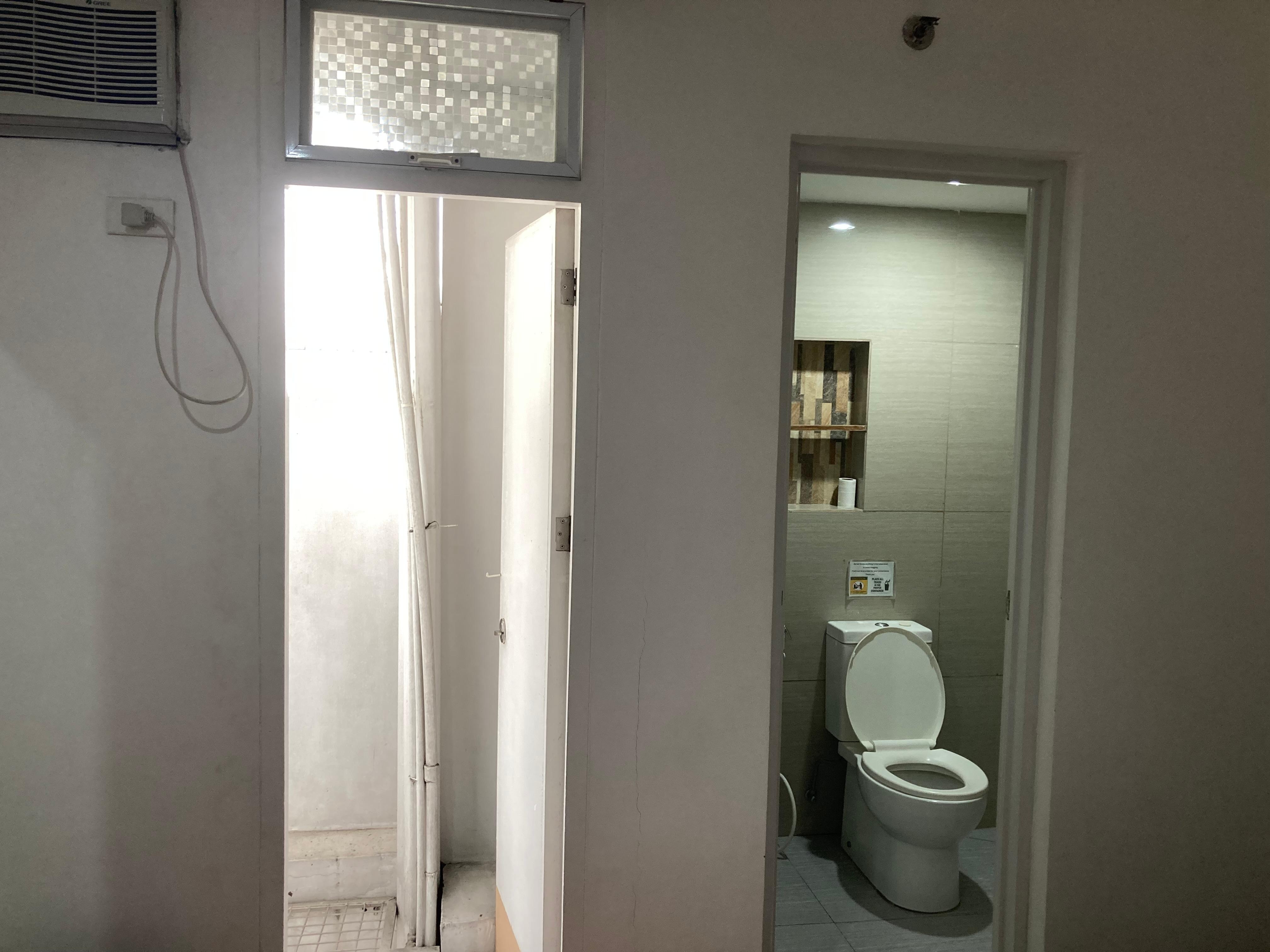 No window but door to balcony.