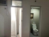 No window but door to balcony.