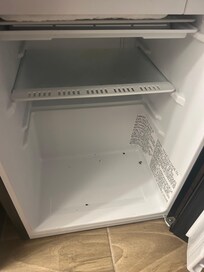 Fridge was dirty and was not cleaned because there was still things left in it from previous guest.
