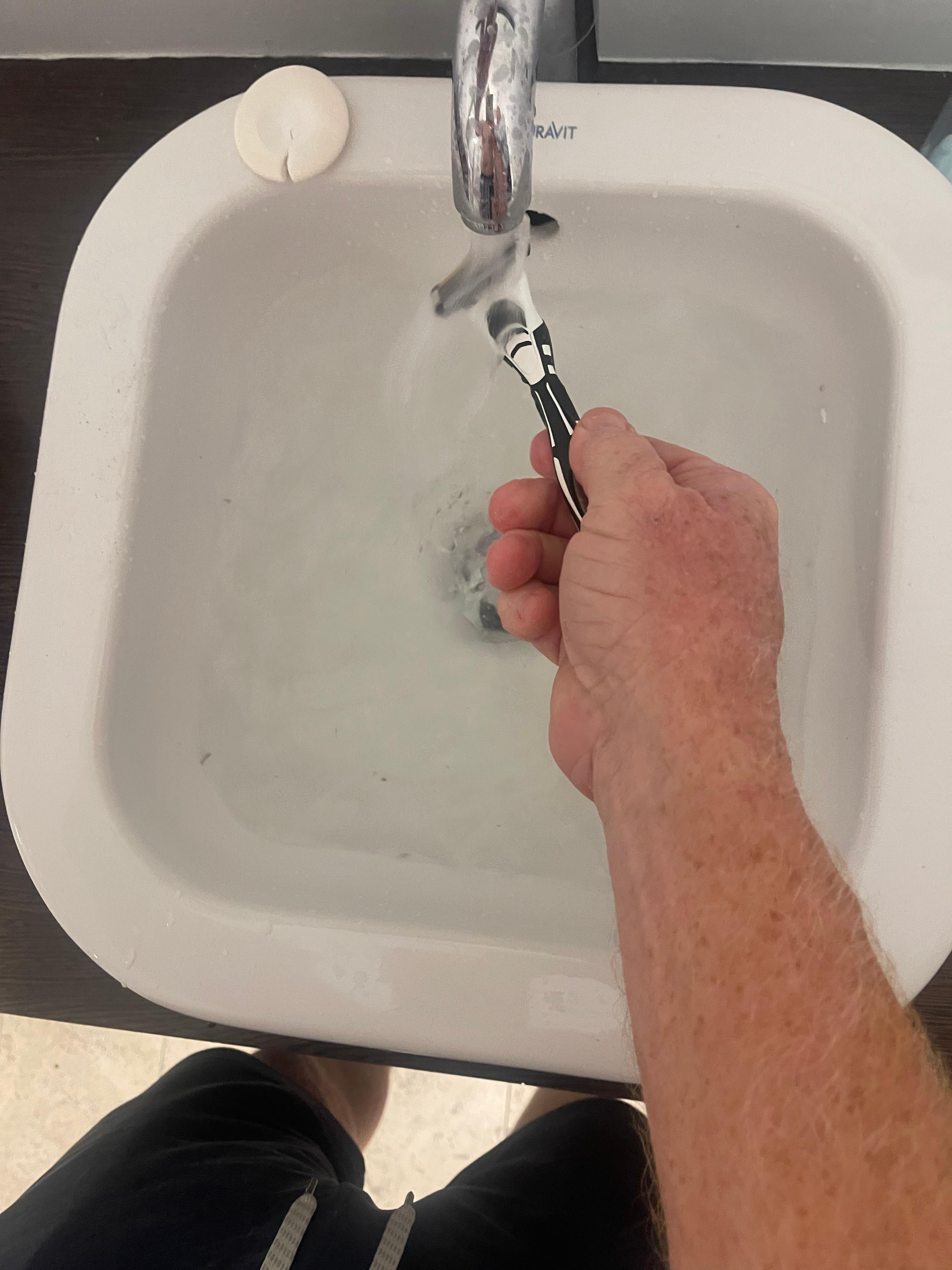 These are pictures showing the sink would not drain in the primary bathroom.