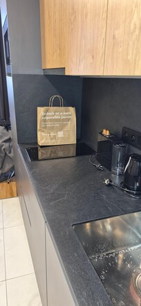 Kitchen. Large fridge. Dishwasher