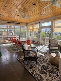 Sun room/picnic table and pizza oven