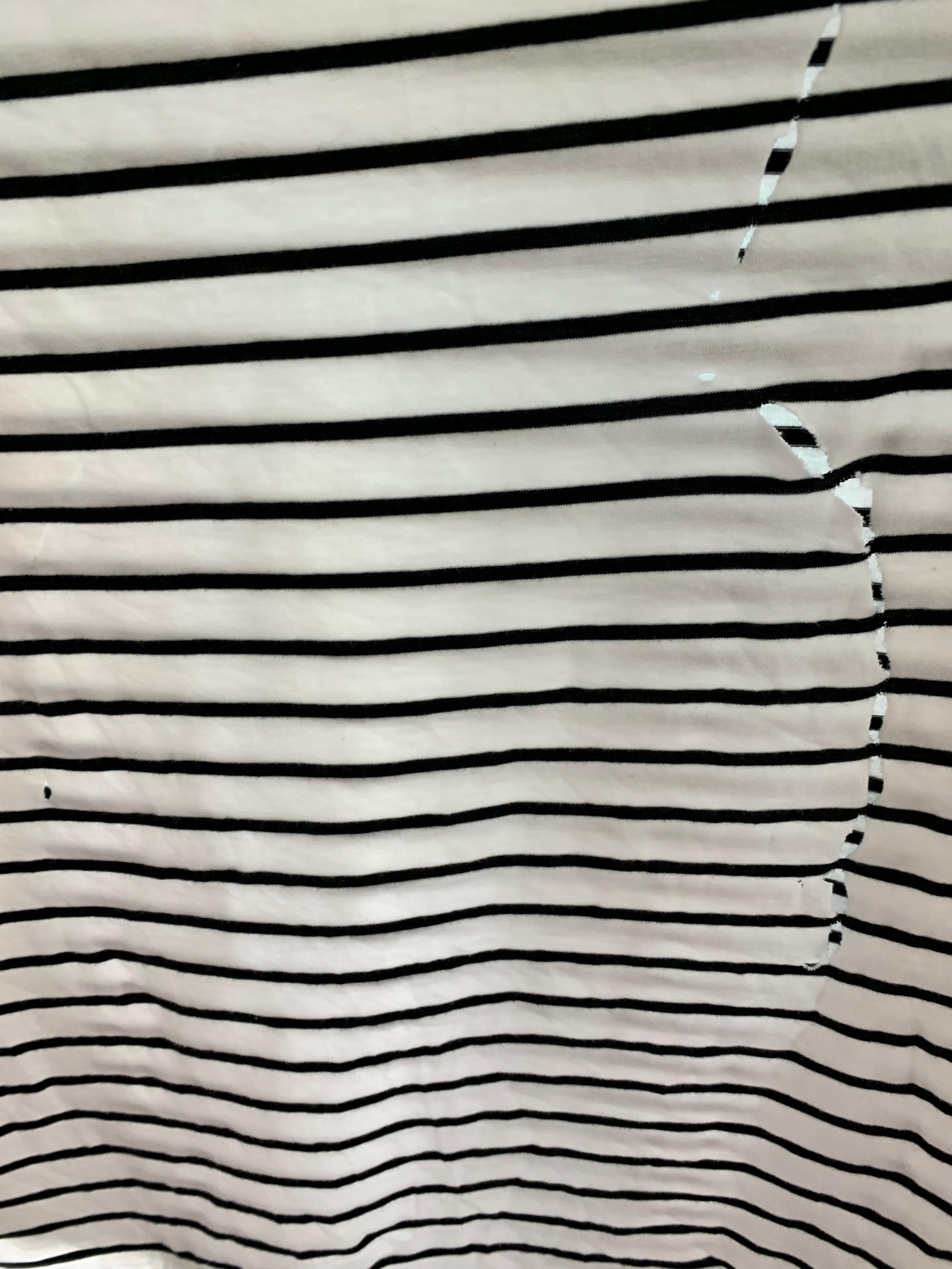 Holes in a shirt once removed from the dryer. We didn’t use it again. Instead washed clothes and hung them to dry. 