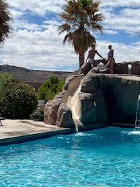 The pool with the waterfall and slide was so fun.