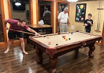 Pool table is in separate room adjacent to swimming pool, hot tub is off this floor on balcony, movie room and laundry room and half bath on this floor.