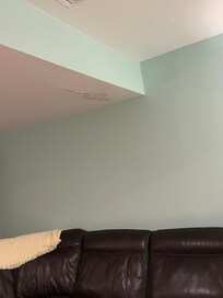 Photos of ceiling in the den near master bedroom