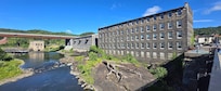 Photo of exterior. Beautiful location on waterway.