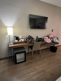 Mini fridge, tv, and desk/chair